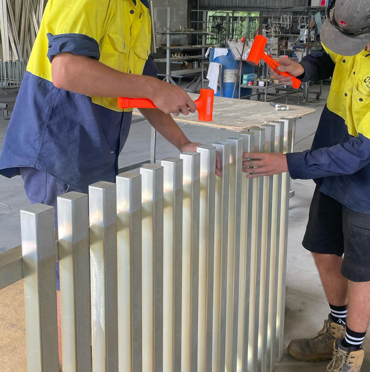Installing aluminium end caps.