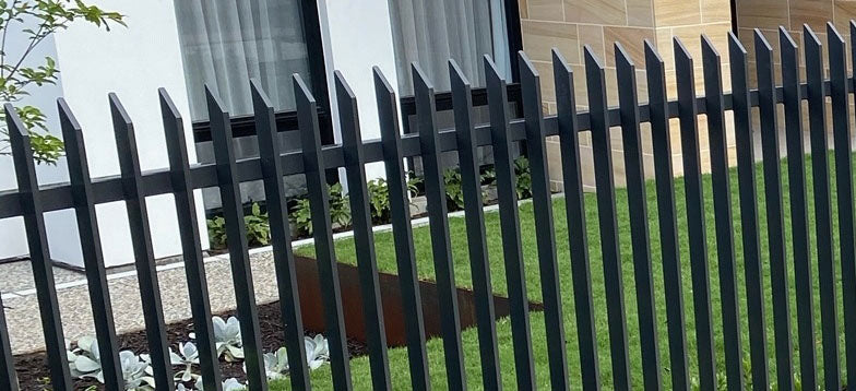 Custom CNC machined aluminium end caps installed on Pelican Panels Beaumont fencing system